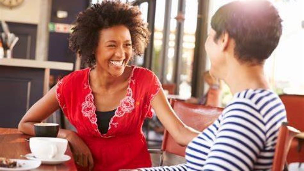 Two people having a supportive mentoring conversation